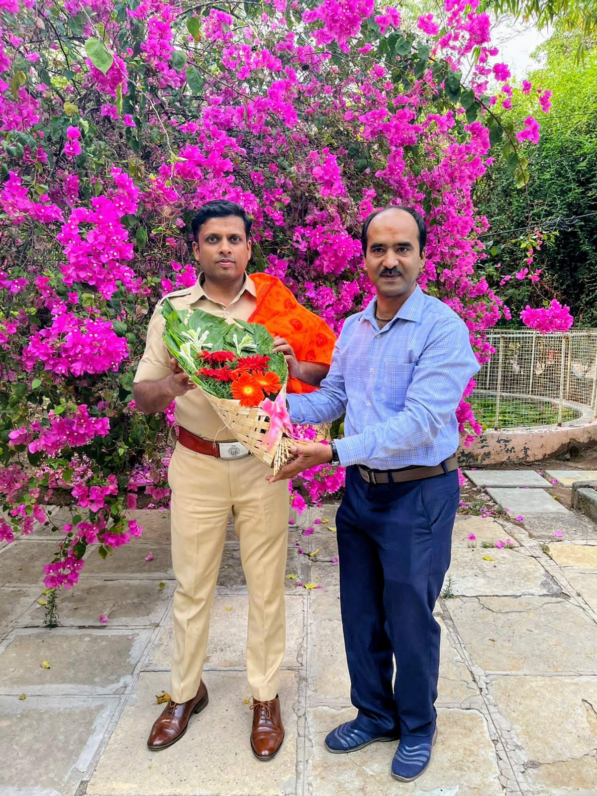 Bouquet felicitation shared between two individuals