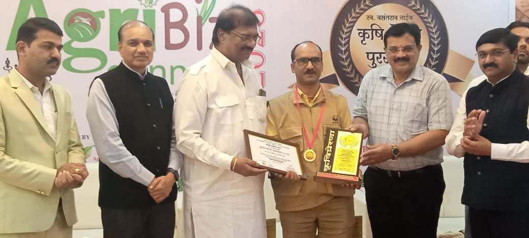Agricultural achievement award presentation on stage